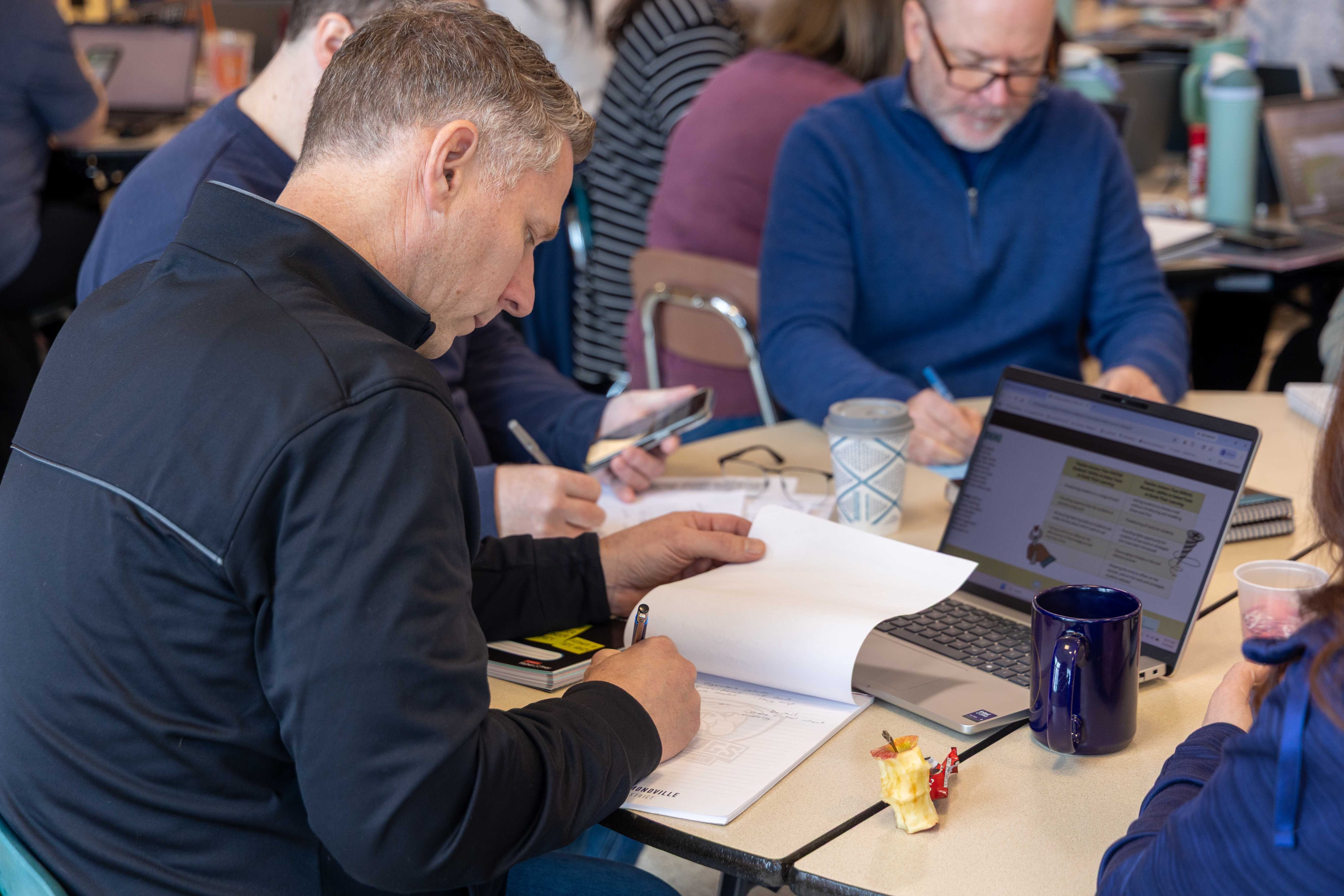 Principal Barr takes notes